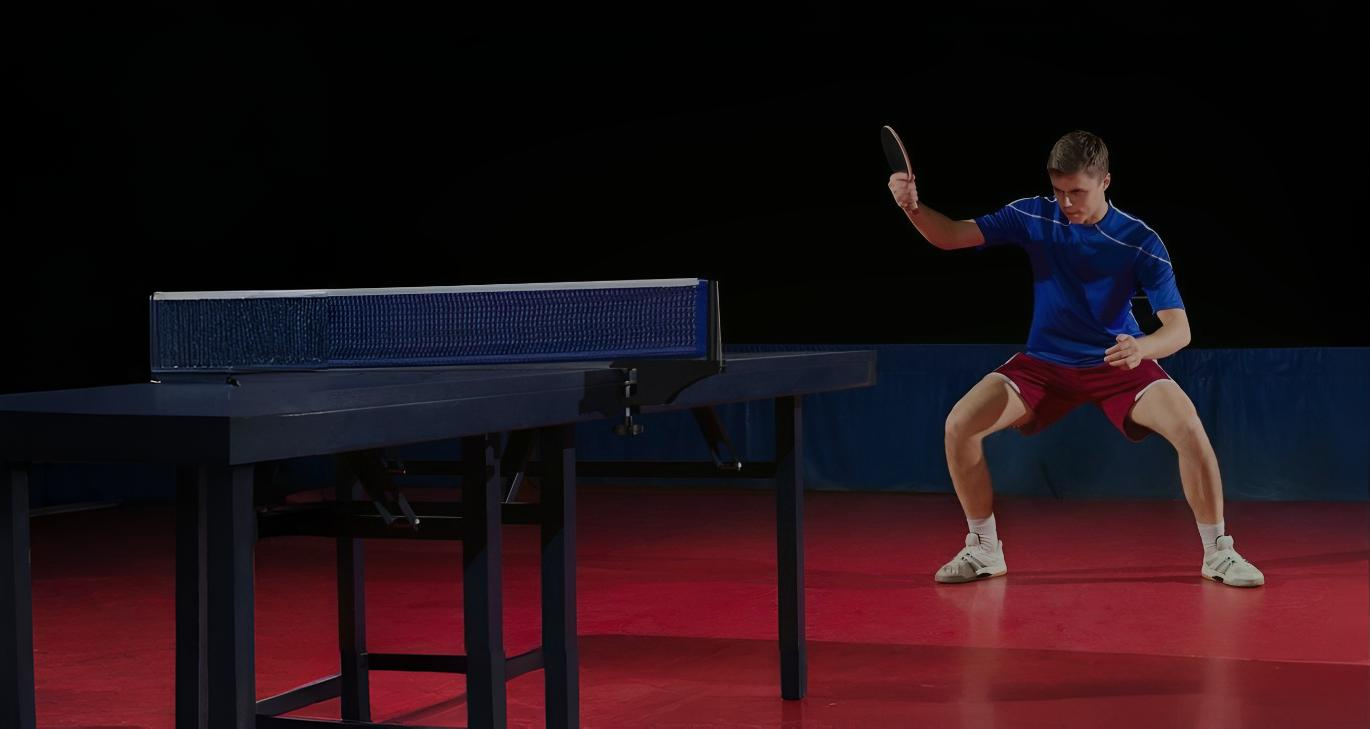 Table tennis player in action at Club Esportiu Joventut, Sant Josep de sa Talaia